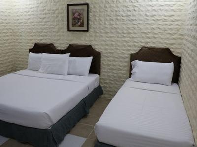 Al Alya Hotel Rooms And Suites - Bild 4